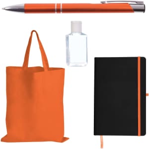An orange tote bag, an orange pen, a small clear bottle, and a black notebook with an orange elastic closure.