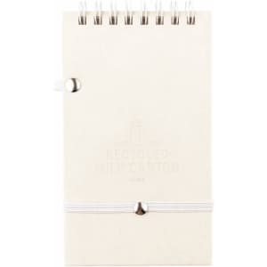 A white notepad made from recycled materials, featuring a spiral binding and a secure closure. It includes a pen.