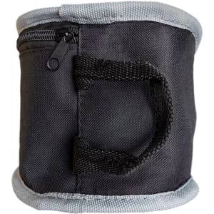 A black, cylindrical bag with a grey trim and a zipper, featuring a small handle on the side.