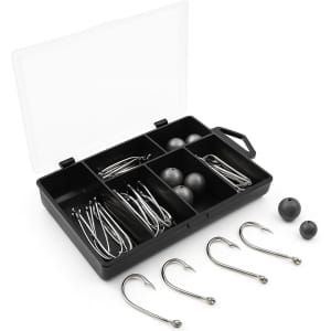A black tackle box containing various fishing hooks and weights, organised in six compartments.