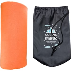 An orange polar blanket next to a drawstring bag with a camping theme and a logo.