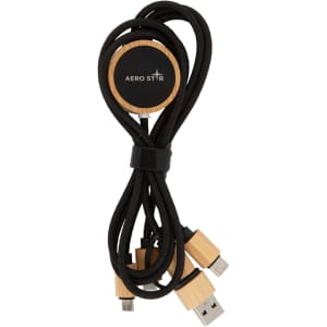 A set of black charging cables with wooden ends, coiled neatly with a round holder featuring a logo.