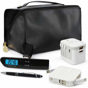 A black travel bag with a digital clock, USB charger, universal power adapter, and a pen.