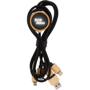 A set of black charging cables with wooden ends, secured with a round wooden holder featuring a logo.