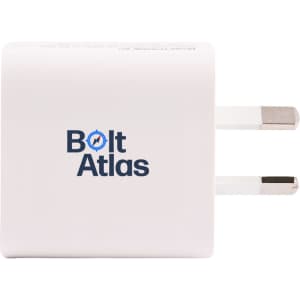 A white power adapter with two metal prongs and a logo on one side.