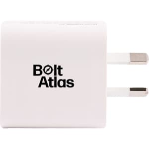 A white power adapter with two prongs and a logo on the front.