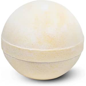 A bath bomb in a spherical shape, featuring a pale yellow hue with a smooth texture. It has a simple design.