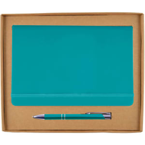 A teal notebook and a matching pen presented in a cardboard gift box. The notebook features an elastic band closure.