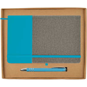 A grey fabric notebook with a turquoise section and a matching turquoise pen in a brown cardboard gift box.