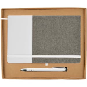 A notebook with a gray fabric cover and a pen, packaged in a cardboard gift box.