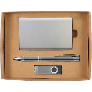 A gift set containing a sleek metal card holder, a metal pen, and a USB flash drive, all presented in a cardboard box.