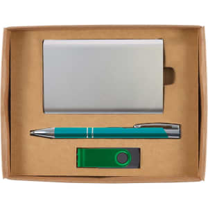 A green pen, silver cardholder, and green USB flash drive arranged in a cardboard gift box.
