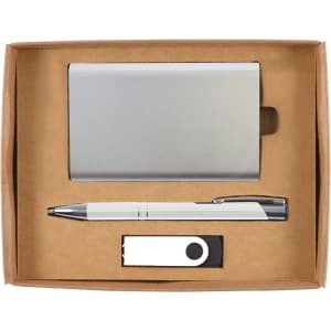 A cardboard gift set featuring a silver business card holder, a silver pen, and a white USB drive.