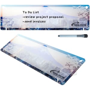 A dry erase board featuring a blue and white design with a mountain and city skyline, along with a marker.