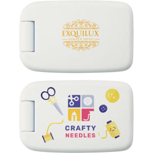 A white sewing kit featuring scissors, buttons, and thread illustrations with a logo on one side.