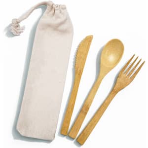 A bamboo cutlery set featuring a fork, knife, and spoon in a calico pouch. The cutlery is light brown, and the pouch is beige.