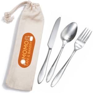 A cutlery set consisting of a fork, knife, and spoon in a cream-coloured calico pouch, featuring a logo.