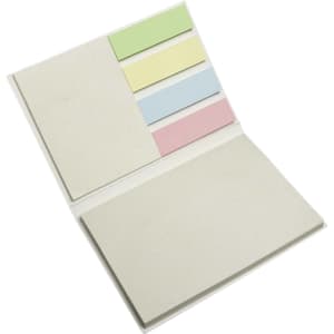 A sticky note booklet featuring pastel-colored notes including green, yellow, blue, and pink on a neutral background.