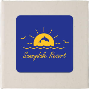 A note block with a blue cover featuring a yellow sunset design and the text "Sunnydale Resort" below a dolphin.