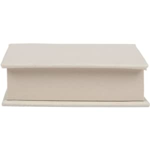 A cream-coloured note block with a simple, flat design. It features a lid and has a logo on the side.