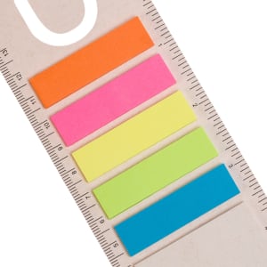 A ruler featuring five colorful sticky note strips: orange, pink, yellow, green, and blue, with a logo on the side.