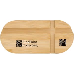 A bamboo phone stand in a sleek oval shape with a logo on the surface.