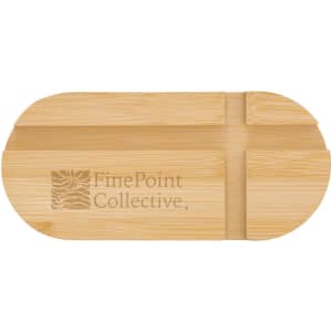 A bamboo phone stand with an oval shape and a logo. It features slits for device placement.