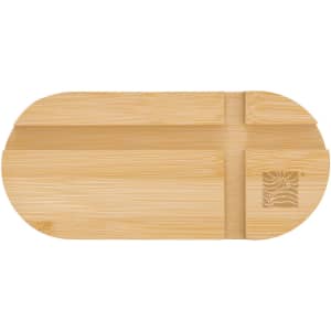 A bamboo phone stand in a light natural colour with a carved logo and multiple slots for device placement.