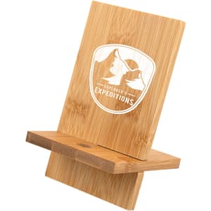 A bamboo phone stand featuring a logo, with a natural wood finish and a minimalist design.
