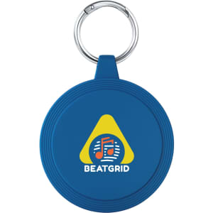 A blue keychain with a circular shape and a logo featuring musical notes and a triangle design.
