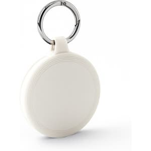 A white keychain with a circular design and a silver metal ring. The keychain features a subtle textured pattern.