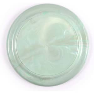 A green, marbled frisbee made from recycled materials, showcasing a smooth, circular design.