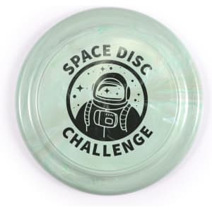 A flying disc featuring a marbled green design with the text "SPACE DISC CHALLENGE" and an illustration of an astronaut.