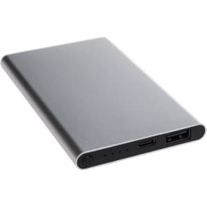 A sleek, silver 4,000mAh power bank with a USB and USB-C port, featuring a small indicator light.