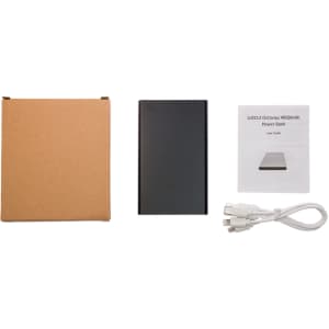 A black 4,000mAh power bank, a user manual, a charging cable, and a brown box are displayed together.