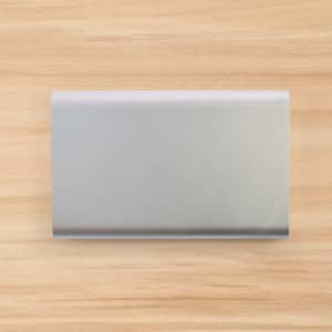 A sleek silver power bank with an 8,000mAh capacity.