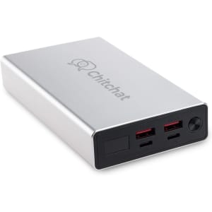A silver power bank with two USB ports and a logo. The design is sleek and compact, ideal for technology use.