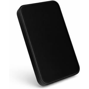 A sleek black power bank with a smooth surface, featuring a minimalist design and a subtle logo.