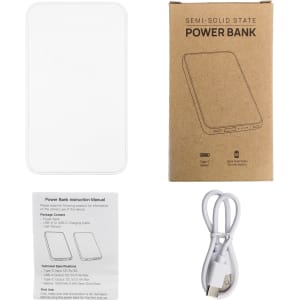 A white power bank with a sleek design, accompanied by a charging cable and an instruction manual.