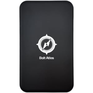 A black power bank with a compass logo on the front and a smooth matte finish.