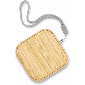 A square wireless charger with a bamboo finish and a grey cord. It features a logo on its surface.