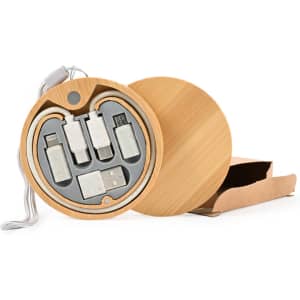A circular bamboo charging cable set with various connectors displayed in a round case, alongside a brown cardboard box.
