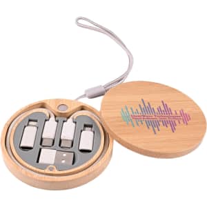 A round bamboo case containing multiple charging cables in silver and gray, featuring a logo on the lid.