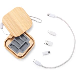 A bamboo case containing three charging cables in grey, with USB and micro USB connectors.