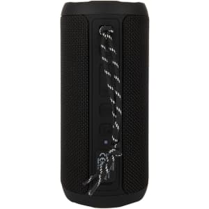 A black Bluetooth speaker with a textured surface and a hanging strap, featuring buttons and a logo.
