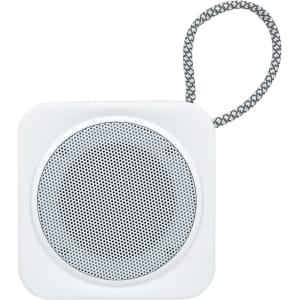 A square white mini speaker with a grey mesh grille and a woven strap attached.