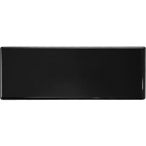 A sleek black speaker with a glossy finish, featuring a logo on the front.