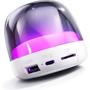 A compact speaker featuring a glossy purple dome and white base, with USB and auxiliary ports.