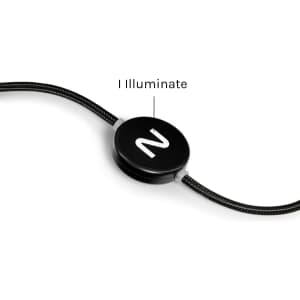 A black charging cable with a round illuminative connector and woven texture. It features branding on the connector.