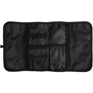 A black toiletry bag organizer with multiple compartments and mesh pockets for storage. It has a zippered closure.